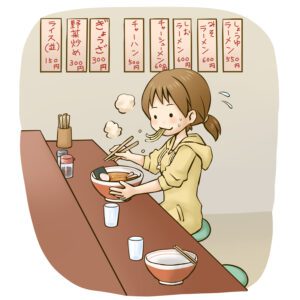 ラーメンをすすっている画像です。